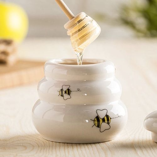 Honigtopf aus Keramik mit Holzlöffel
